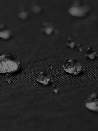 Water beading on an article of Filium-activated fabric [Mobile crop]