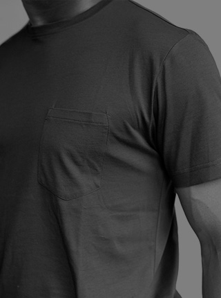Black and white chest view photo of a man wearing a Filium-activated t-shirt