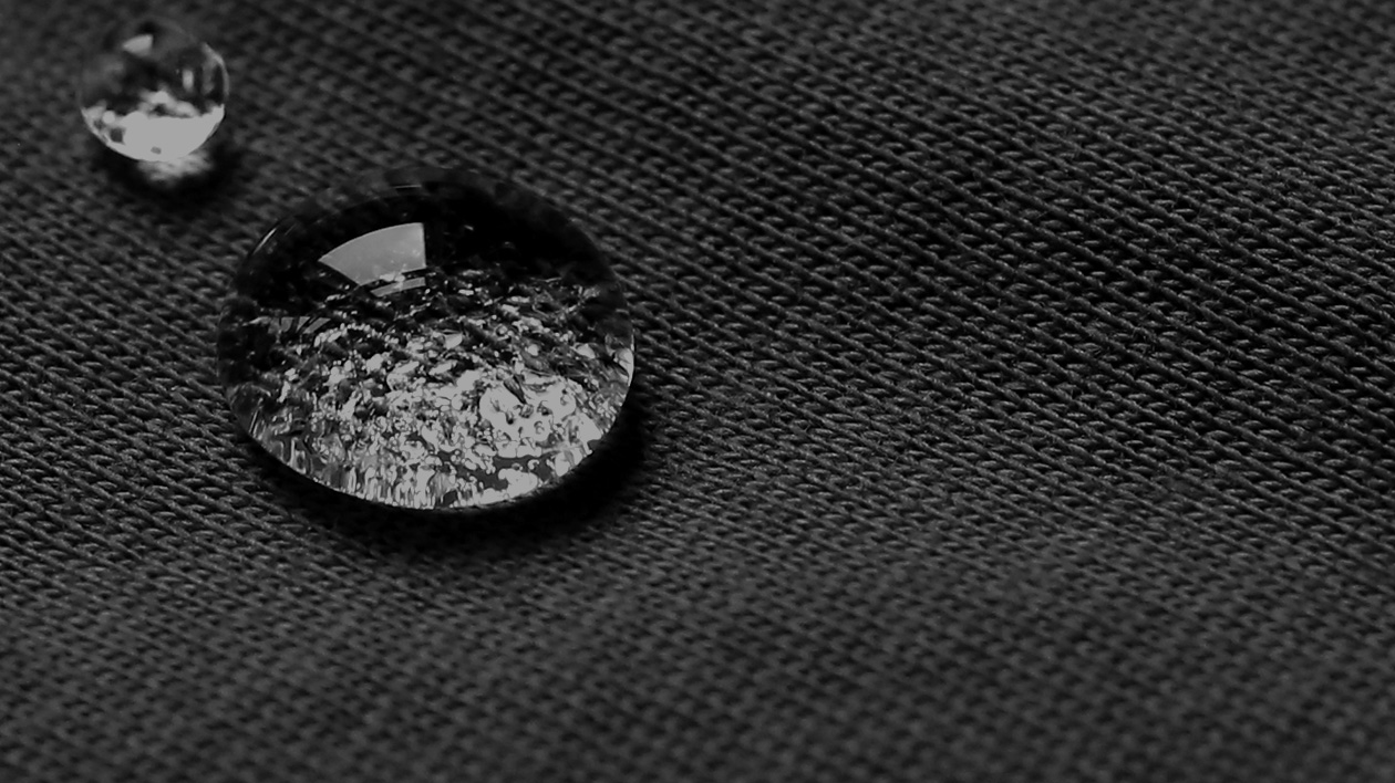 Water beading on an article of Filium-activated natural fabric